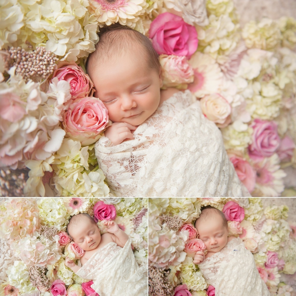 Newborn baby in flowers