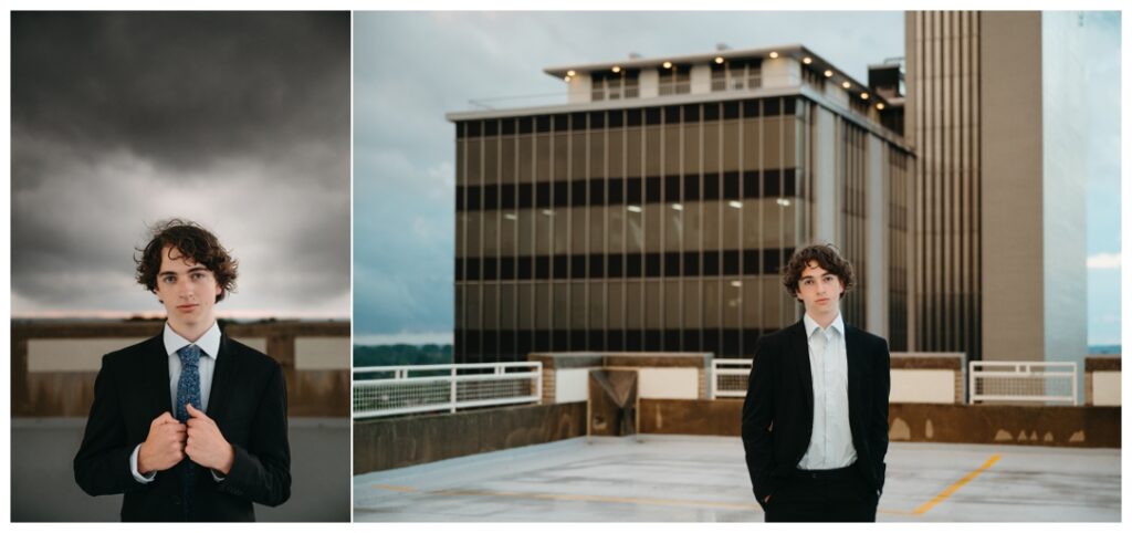 shy senior boy poses on a parking garage with stormy skys for photography 